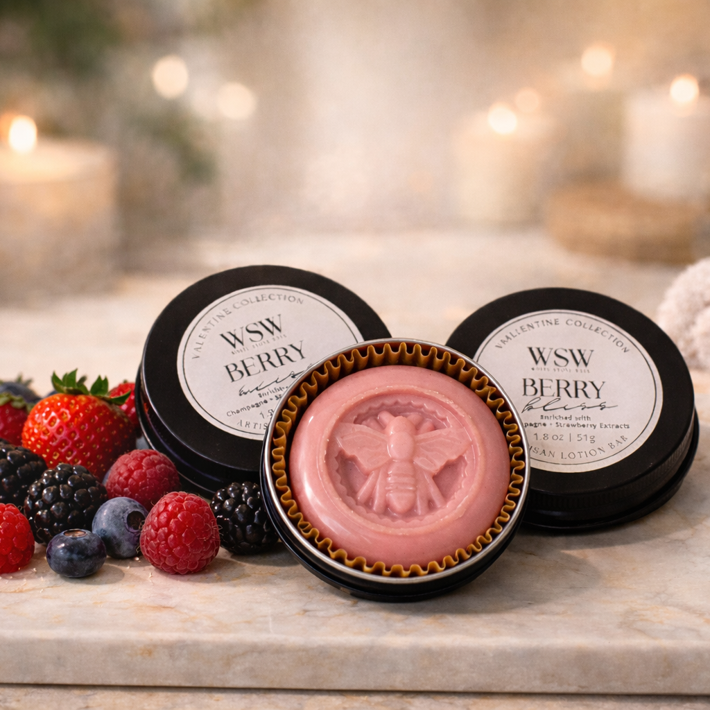 Pink soap bar with black lid on a marble slab with berries and WSW branding.